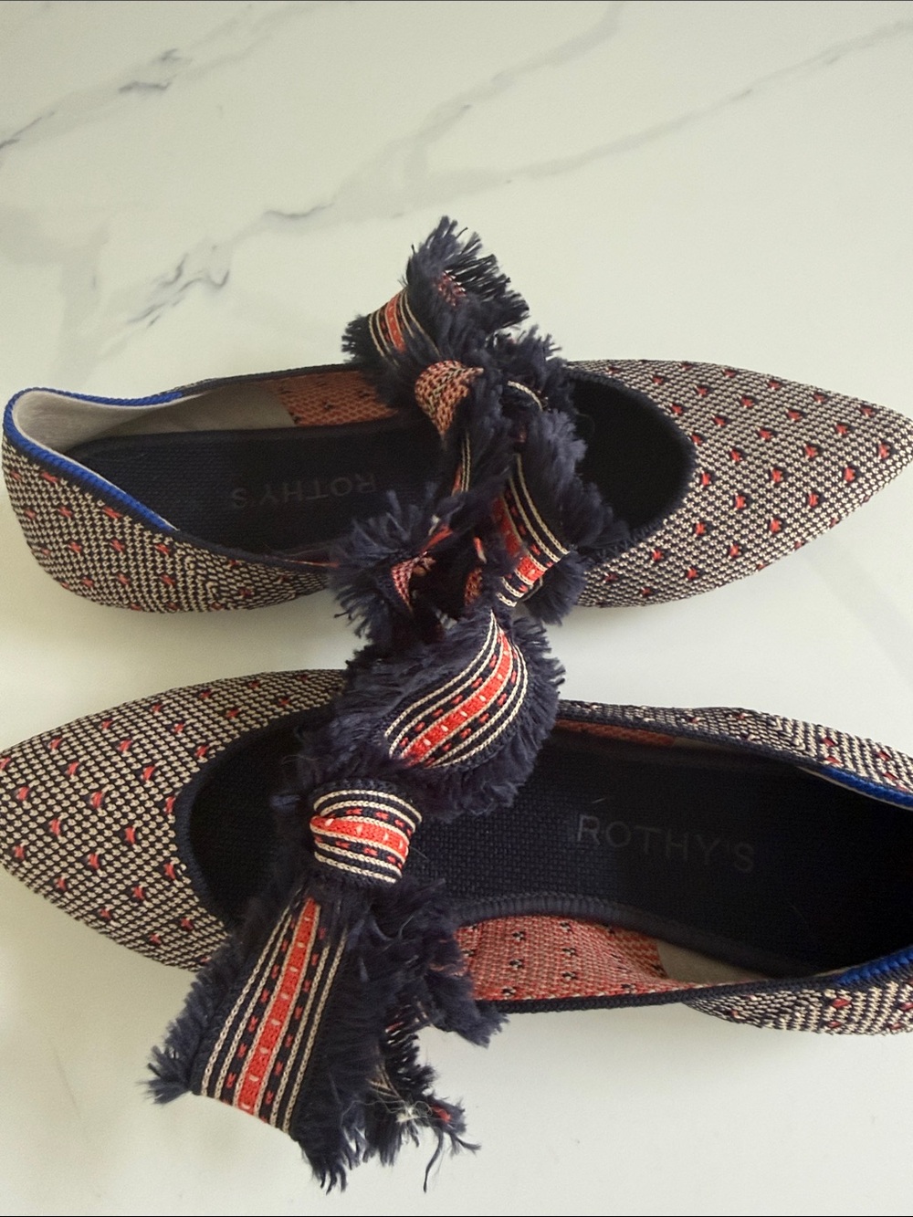 Rothy's Pointed Flats in Navy with Red Accents